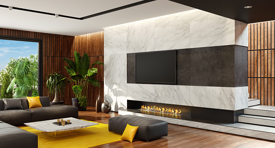Tv on stone and wooden wall