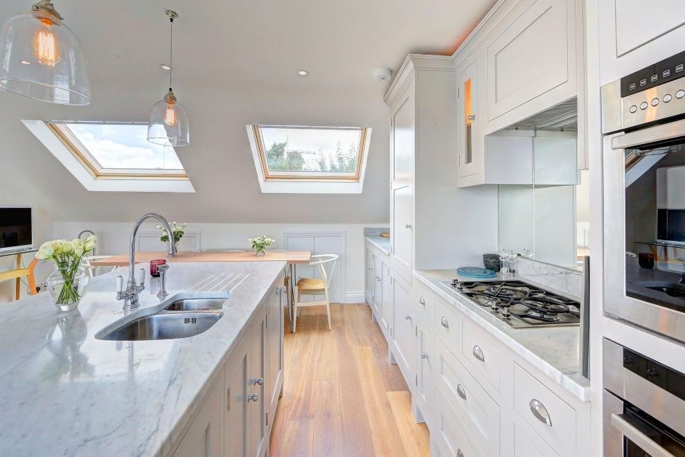 A galley kitchen may present design challenges, but with careful planning and thoughtful choices, it can become a highly functional and stylish space.